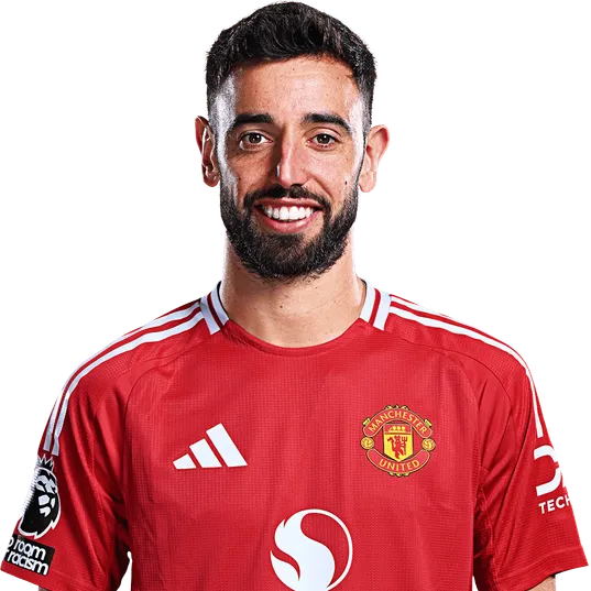 MAN UNITED Bruno Fernandes sonriendo con la camiseta local roja del Manchester United sobre un fondo blanco.